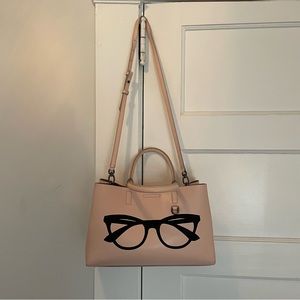 Banana Republic pink Larkin bag with sunglass artwork.